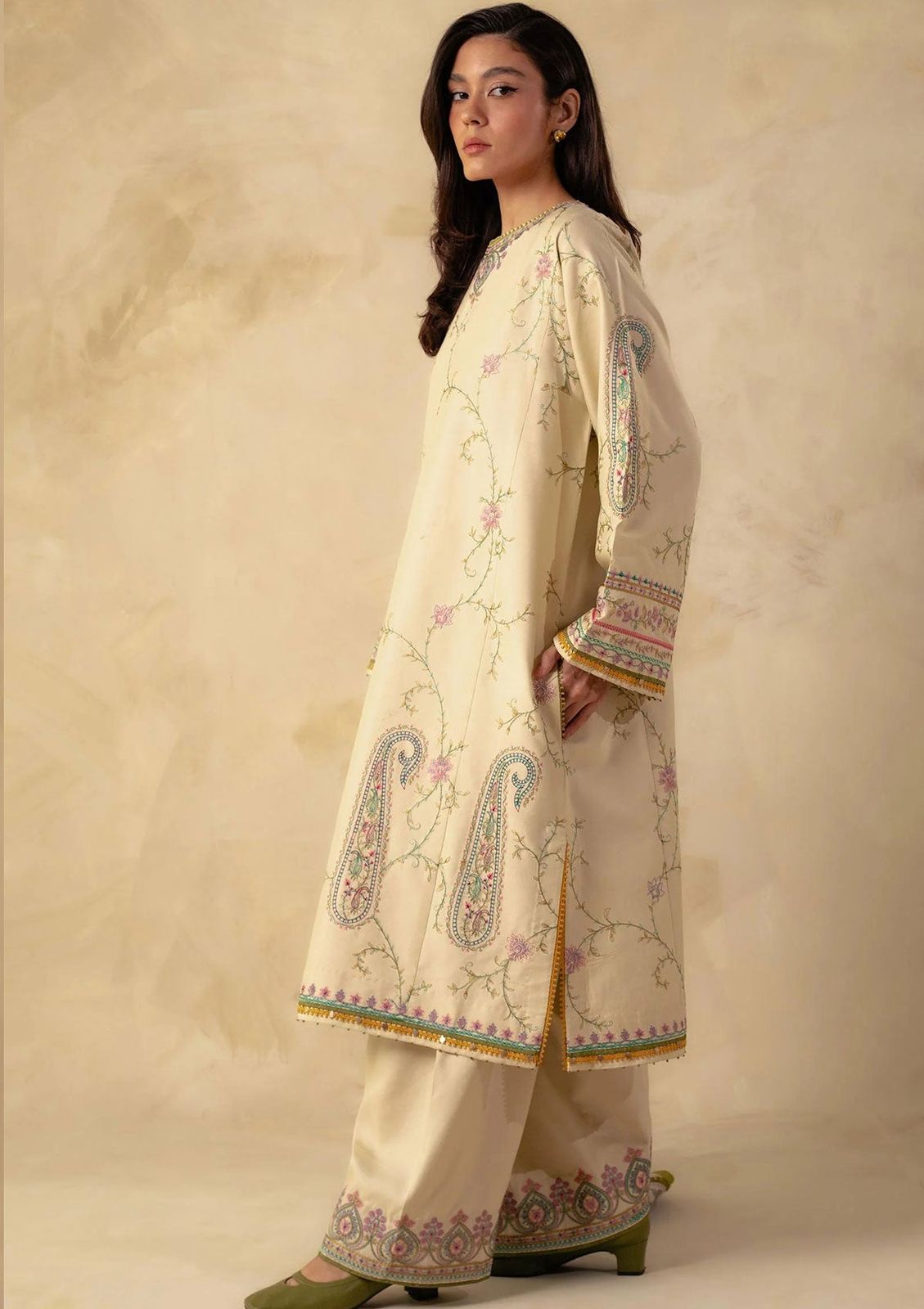 A premium embroidered lawn suit collection with intricate details and luxurious fabric - Kapra Collection