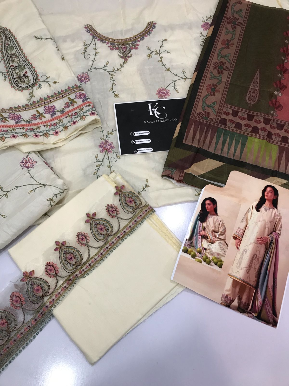 A premium embroidered lawn suit collection with intricate details and luxurious fabric - Kapra Collection