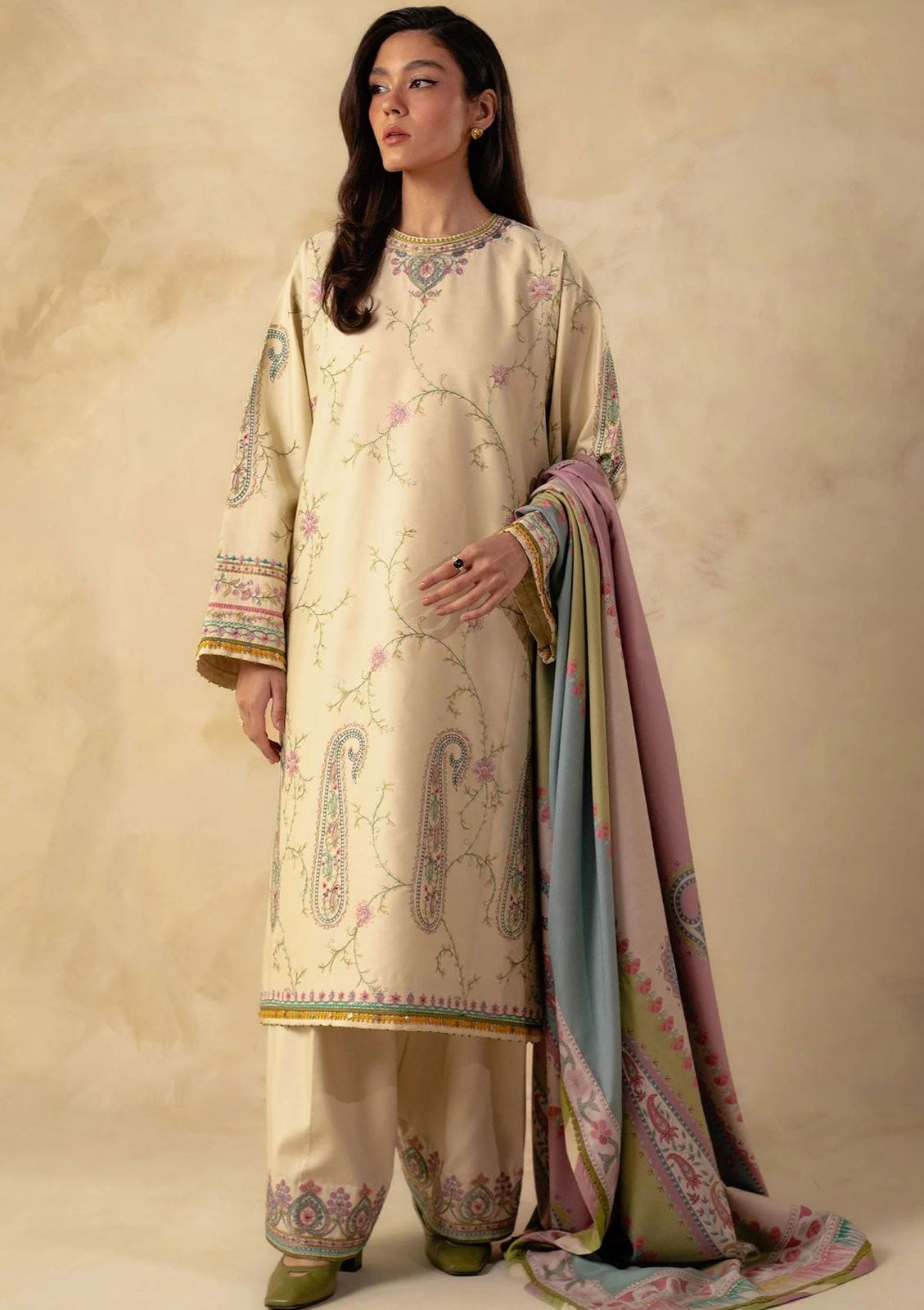 A premium embroidered lawn suit collection with intricate details and luxurious fabric - Kapra Collection
