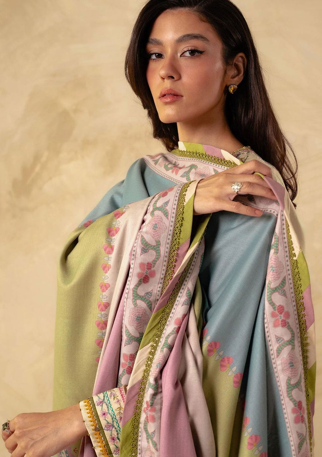 A premium embroidered lawn suit collection with intricate details and luxurious fabric - Kapra Collection