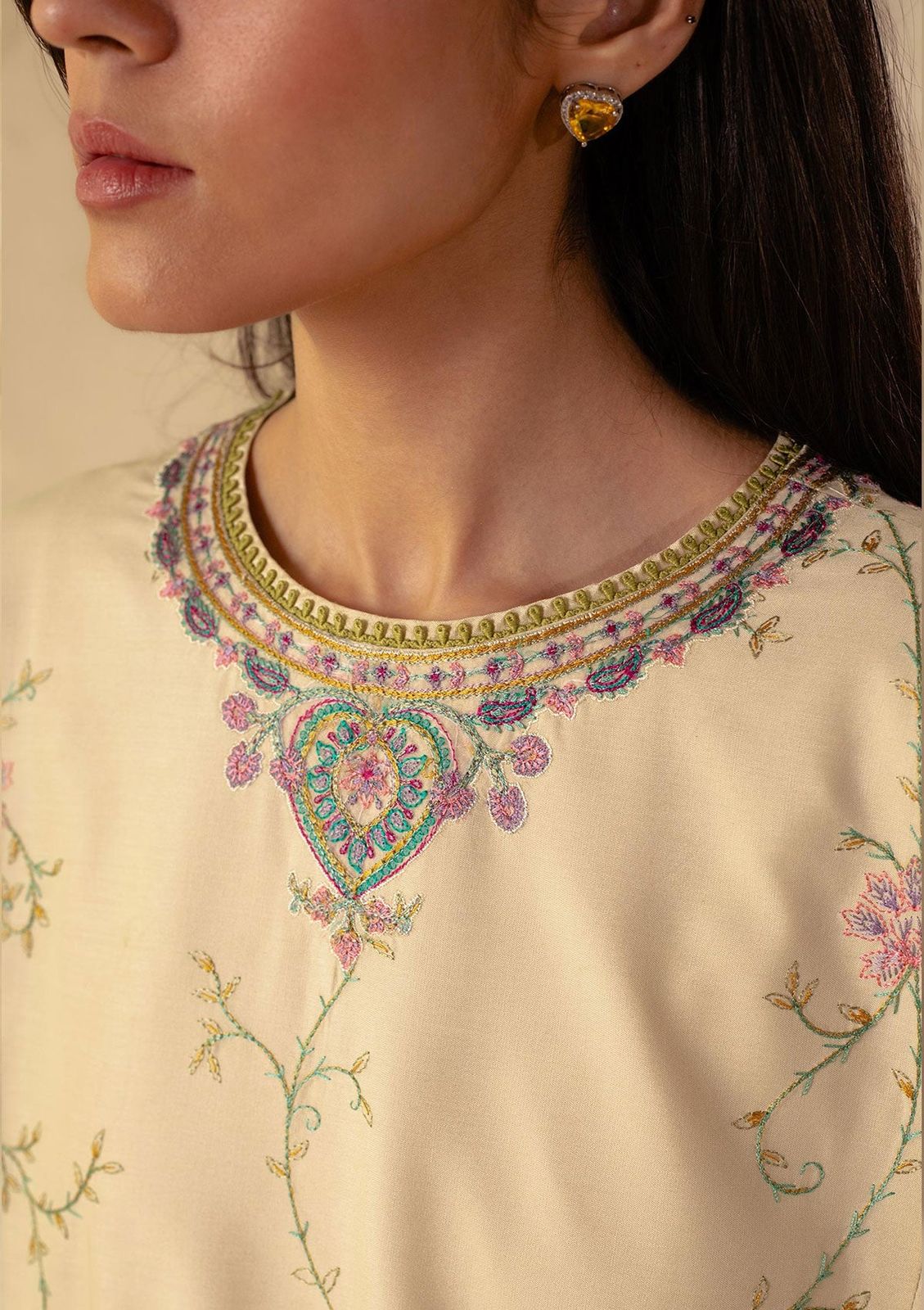 A premium embroidered lawn suit collection with intricate details and luxurious fabric - Kapra Collection