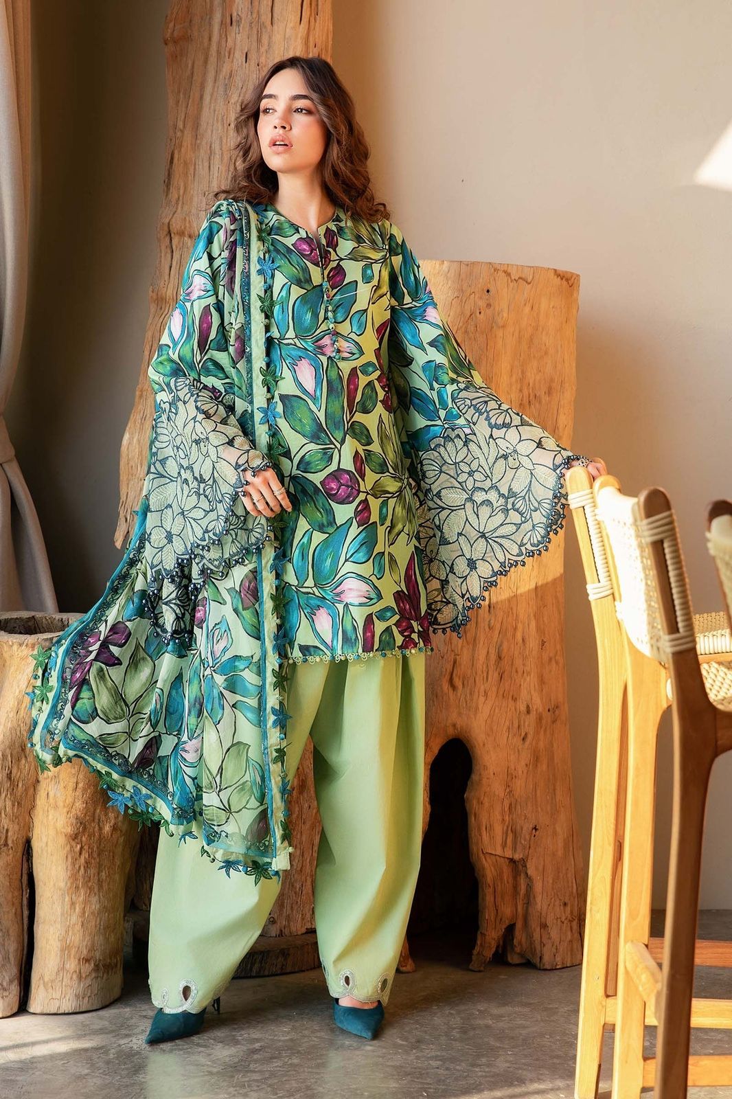 "3-piece unstitched printed lawn suit" typically refers to a set of fabric components designed to be stitched into a complete outfit, - Kapra Collection