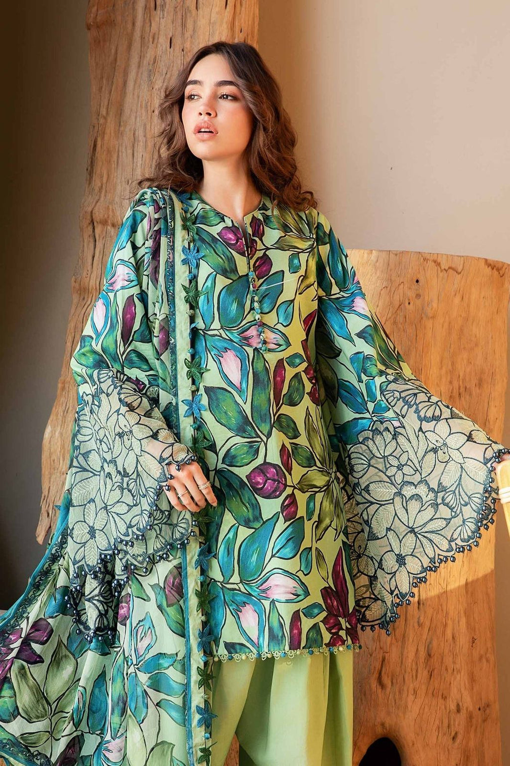 "3-piece unstitched printed lawn suit" typically refers to a set of fabric components designed to be stitched into a complete outfit, - Kapra Collection