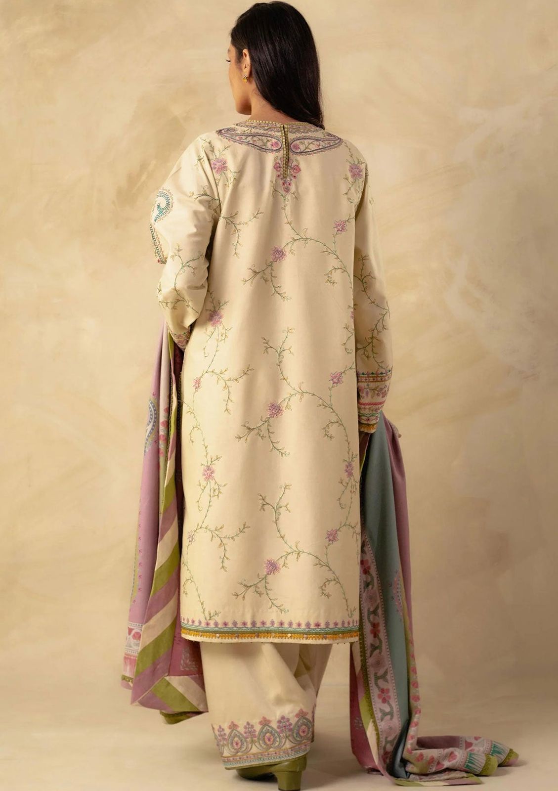 A premium embroidered lawn suit collection with intricate details and luxurious fabric - Kapra Collection