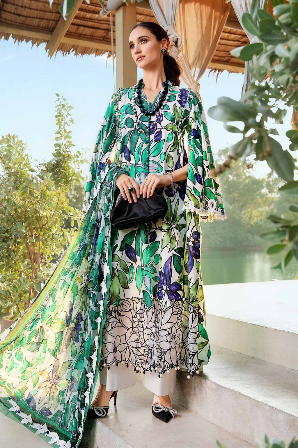 3-piece unstitched printed lawn suit in the "M print" style. These are typically fabric sets for making summer outfits The three pieces usually include: - Kapra Collection