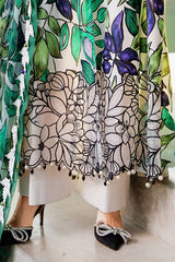 3-piece unstitched printed lawn suit in the "M print" style. These are typically fabric sets for making summer outfits The three pieces usually include: - Kapra Collection