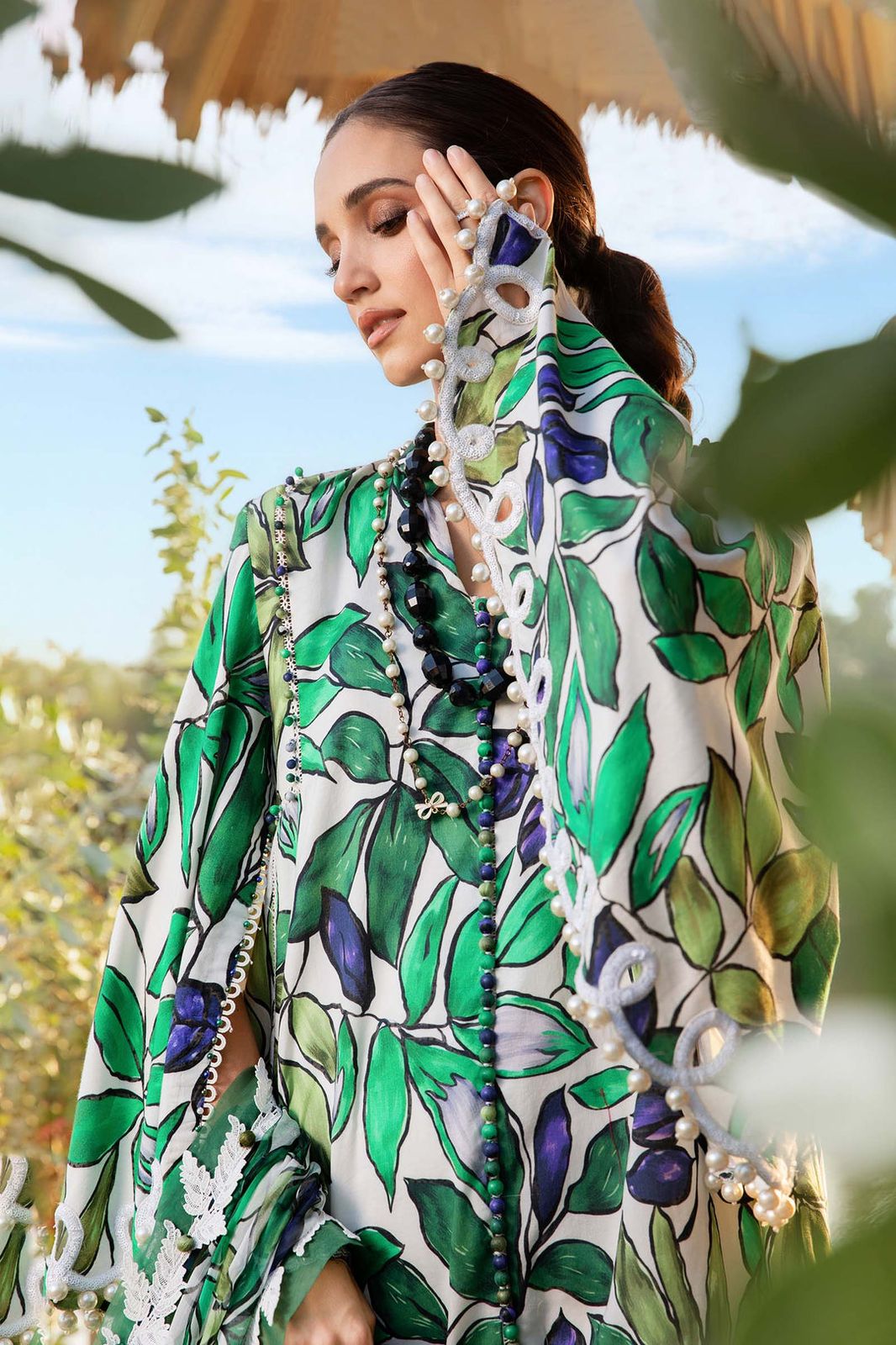 3-piece unstitched printed lawn suit in the "M print" style. These are typically fabric sets for making summer outfits The three pieces usually include: - Kapra Collection